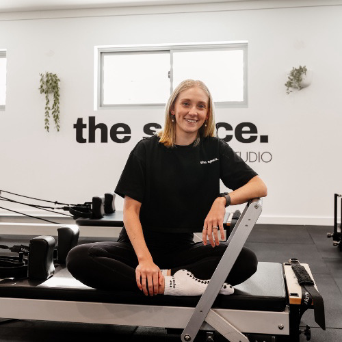 Emily, instructor at The Space Pilates Studio